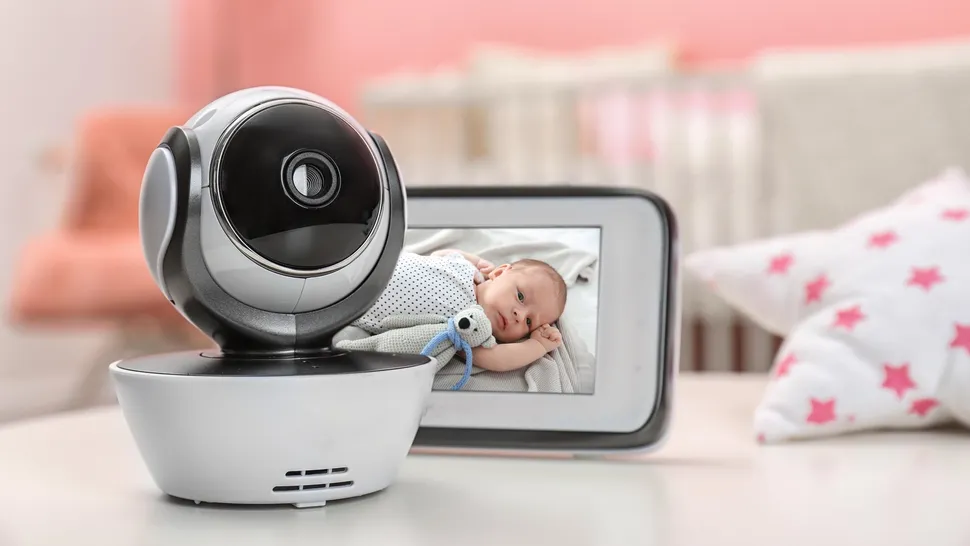 High-quality baby monitor with camera and parent unit on nursery shelf – best baby monitors 2025
